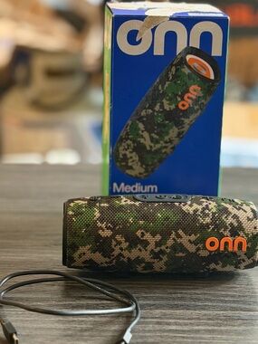 Onn Camouflage Green Portable Bluetooth Speaker with Orange Logo